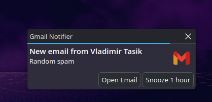 Desktop notification showing new email from John Doe
